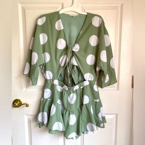 Mint Green ruffle romper, size large, worn once from express boutique line